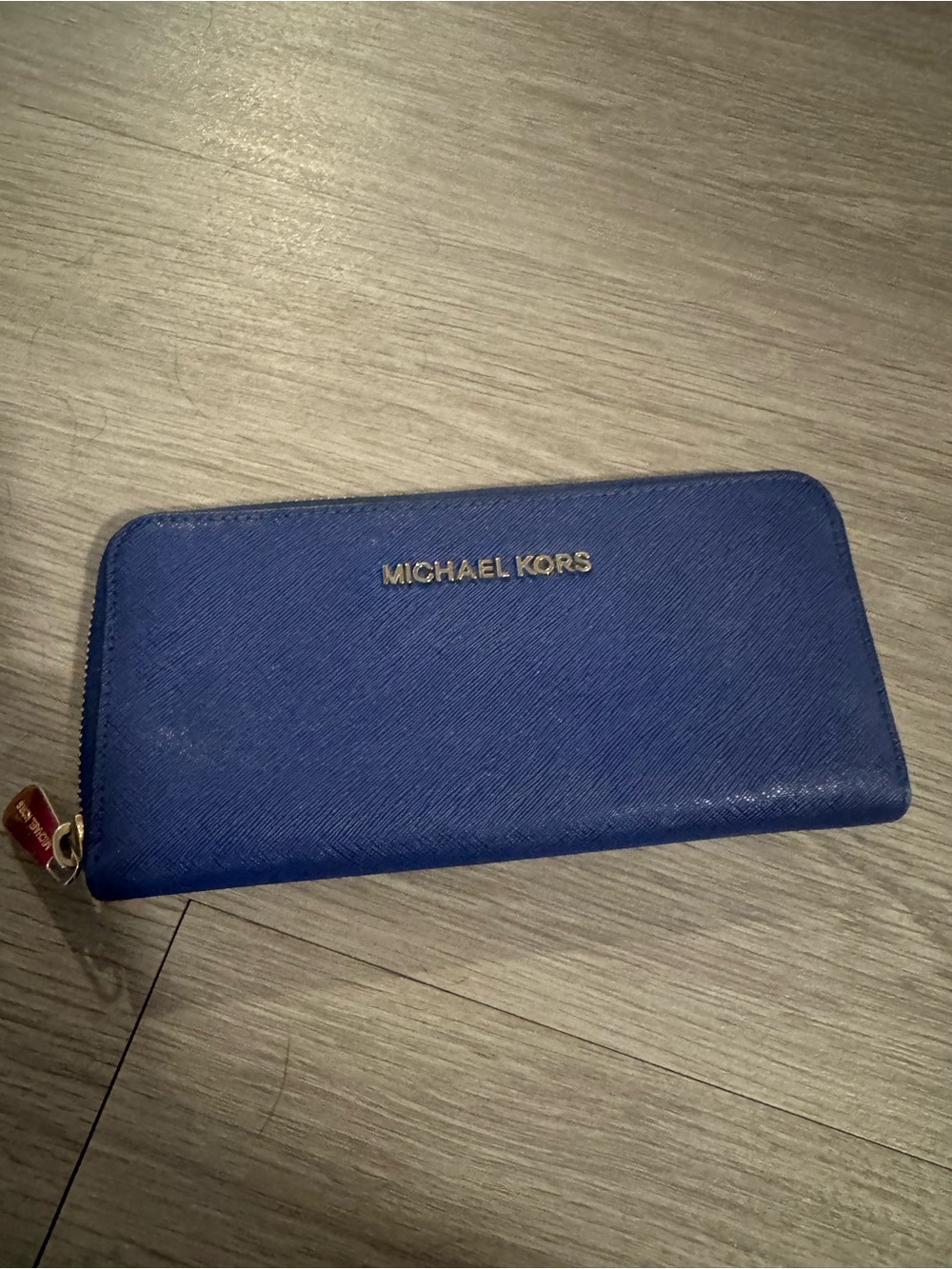 Michael Kors Navy Blue Saffiano Zip Wallet with Gold Logo